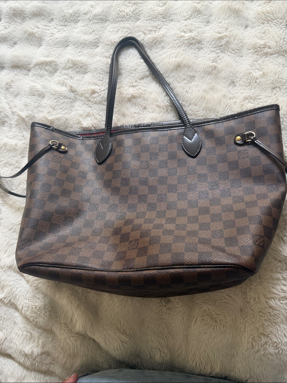 Louis Vuitton neverfull bag.